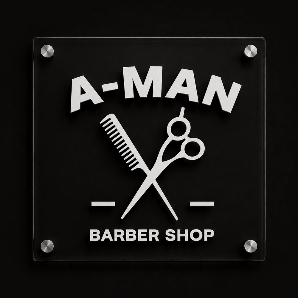 The A-Man Barber Shop sign: a comb and scissors on a glass plaque